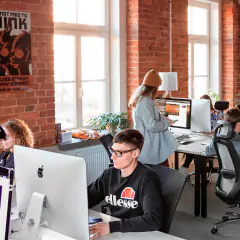 Eris360 creative team working on digital transformation solutions.